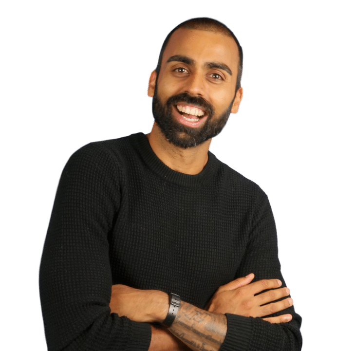 A man in a black sweater with his arms crossed.