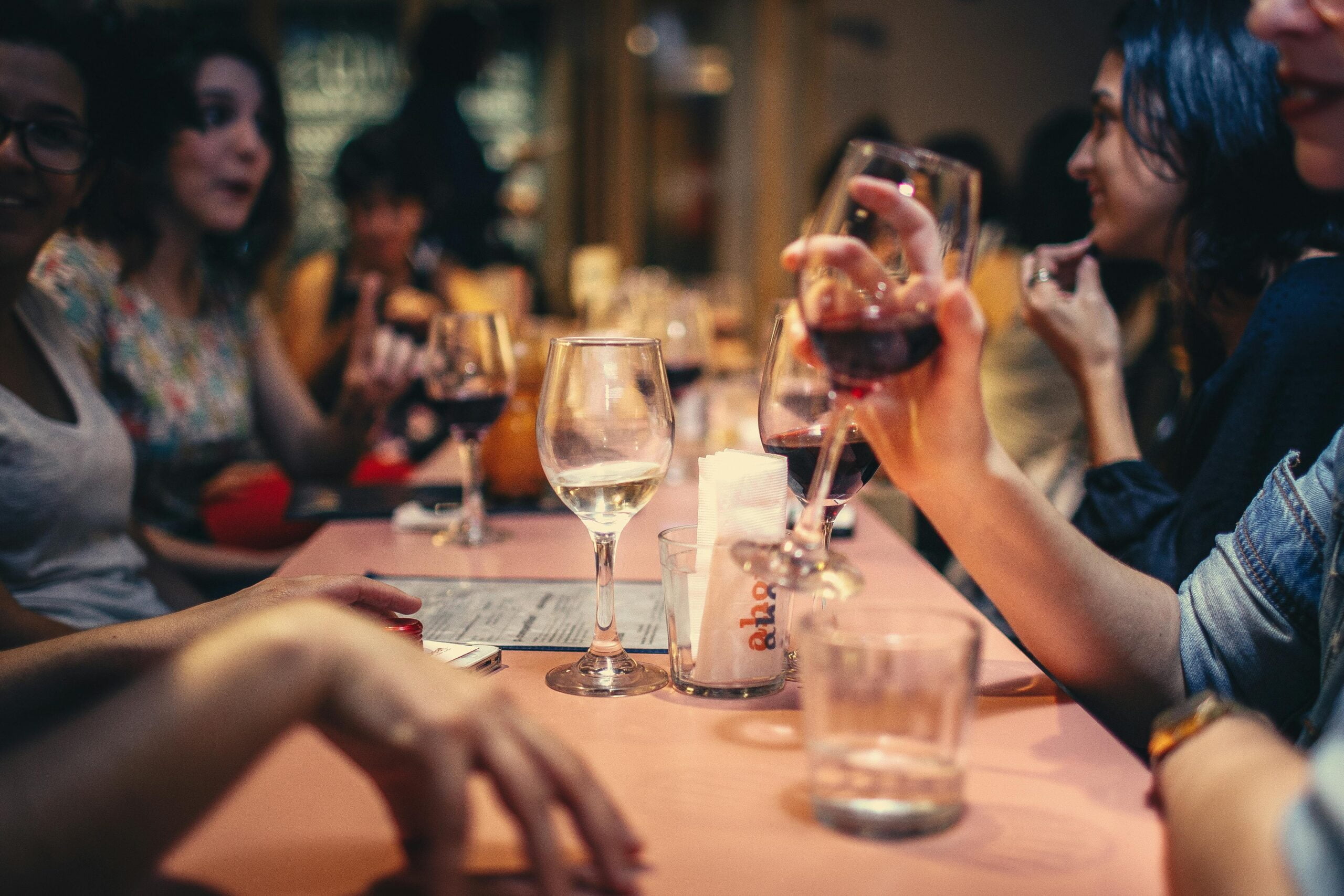 Catalan tapas on a table with a glass of wine and cava