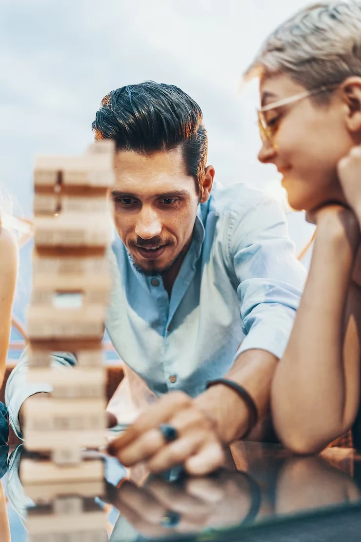 Marketing consultant engaged in focused conversation with client during strategy briefing session