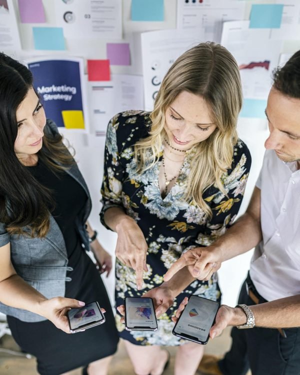 Business people sharing marketing ideas Influencer Marketing Agency, Brand Tracking Agency