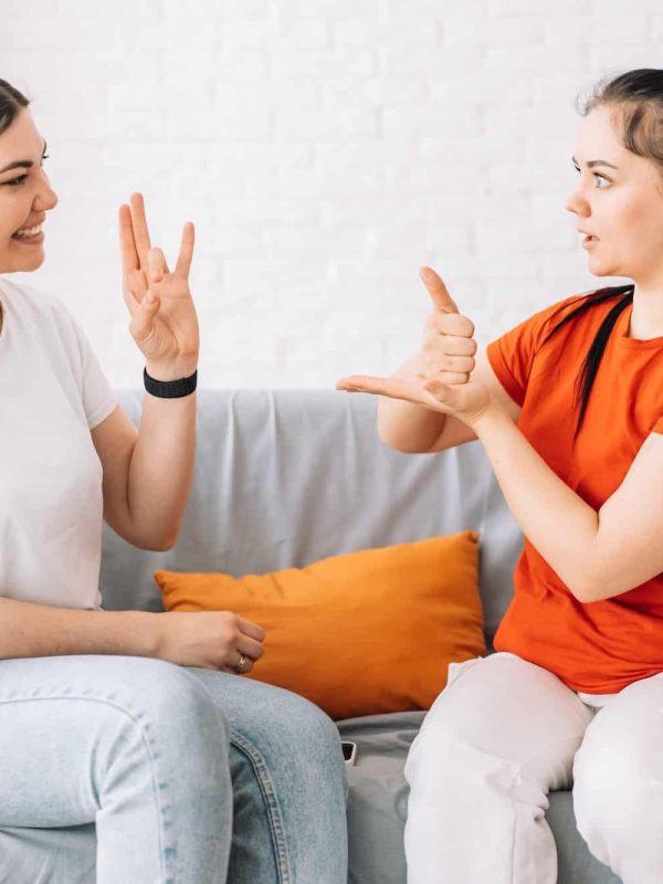 Girl asking for help in sign language