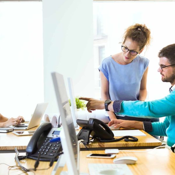 Group of business people working in modern office.