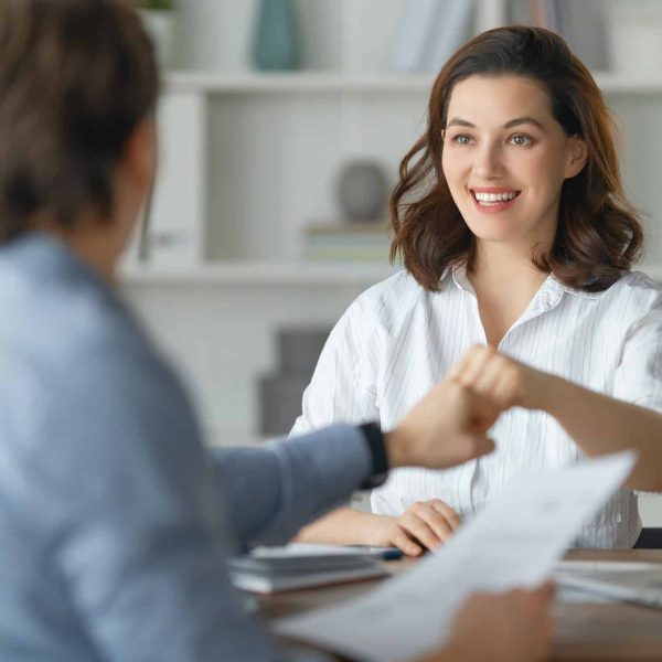 Man and woman are working in office, Brand Engagement Agency