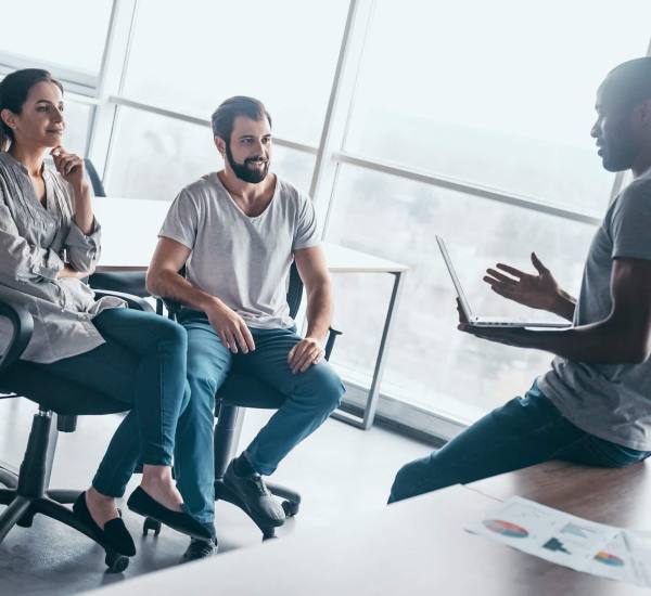 Young professional team discussing business plan in the office