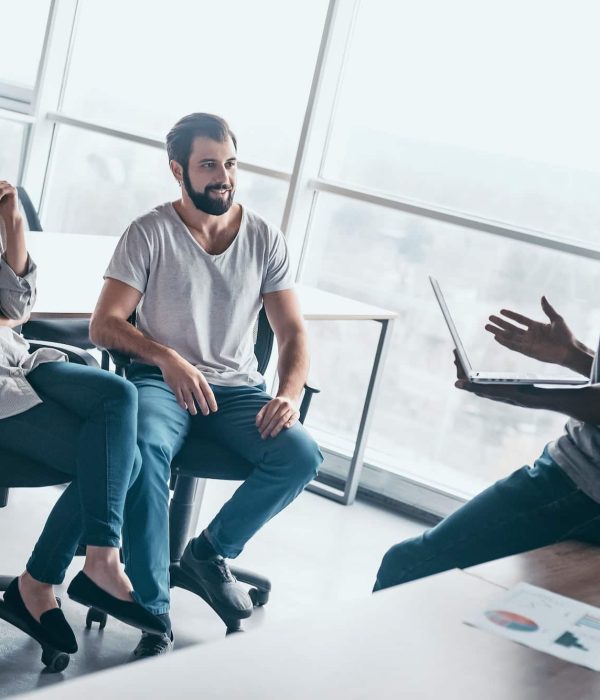 Young professional team discussing business plan in the office